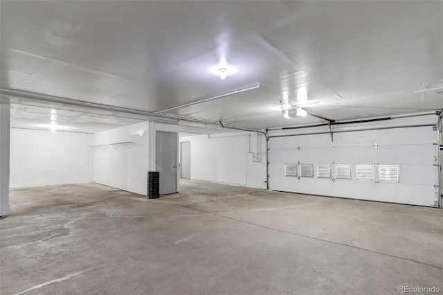 3951 S Carson St Unit D, Aurora, CO 80014 - garage featuring a garage door opener