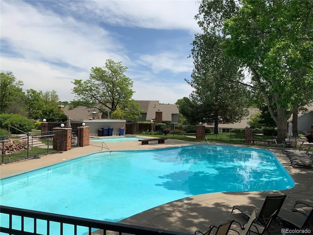 7077 S Knolls Way, Centennial, CO 80122 - community pool with a patio area