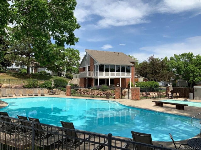 7077 S Knolls Way, Centennial, CO 80122 - community pool featuring a patio