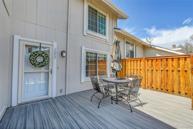 7077 S Knolls Way, Centennial, CO 80122 - wooden terrace featuring outdoor dining space