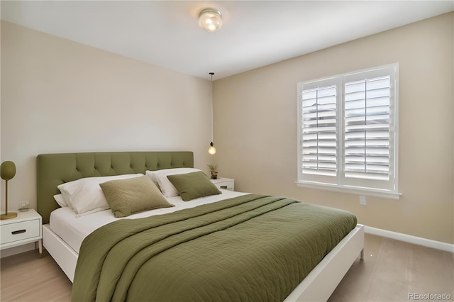 bedroom featuring light wood-type flooring