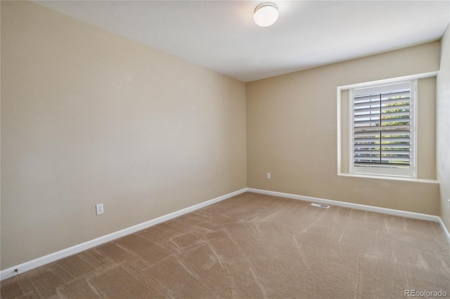 empty room featuring carpet