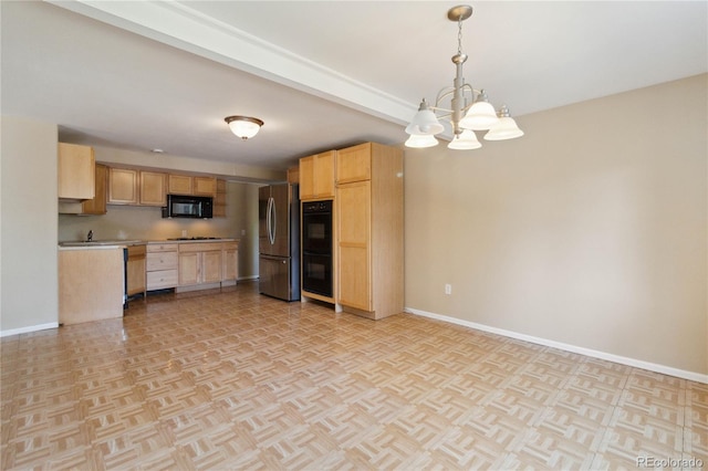 kitchen with a notable chandelier, black appliances, light brown cabinets, pendant lighting, and light parquet floors