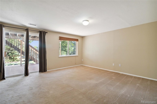 view of carpeted spare room