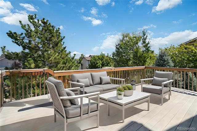 deck with an outdoor hangout area