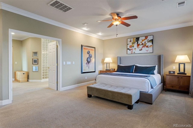 carpeted bedroom with ceiling fan and ornamental molding