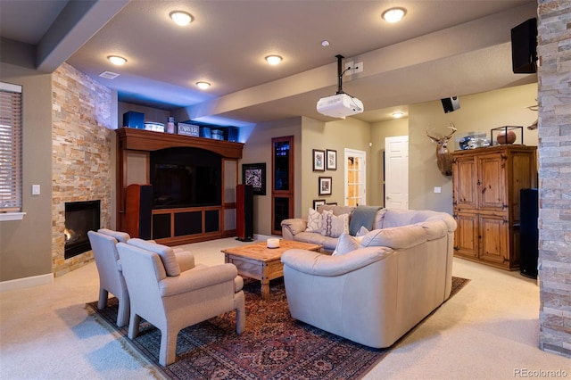 carpeted living room with a fireplace