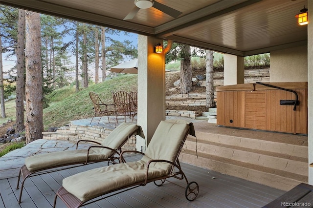 wooden deck with ceiling fan