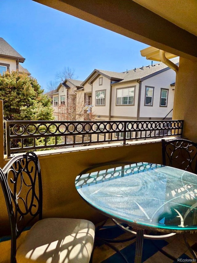 balcony featuring a residential view