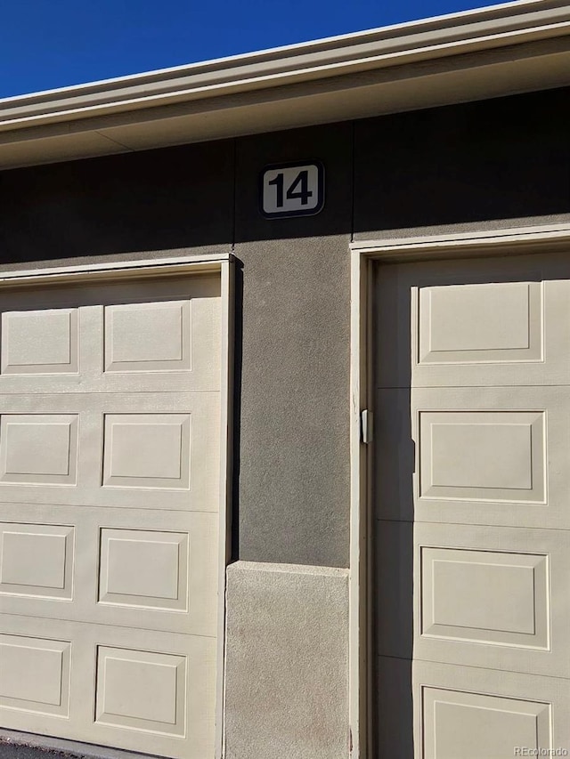 exterior details featuring stucco siding