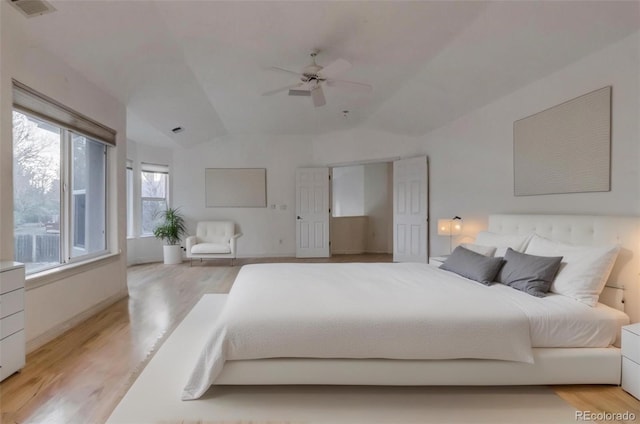 2464 Ginny Way, Lafayette, CO 80026 - bedroom featuring lofted ceiling, light wood-style flooring, and ceiling fan