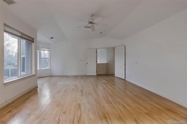 2464 Ginny Way, Lafayette, CO 80026 - spare room featuring light wood-style floors, lofted ceiling, a ceiling fan, and baseboards