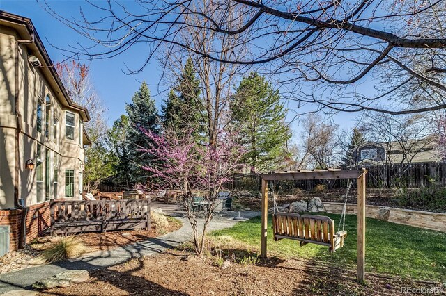 2464 Ginny Way, Lafayette, CO 80026 - view of yard with a wooden deck