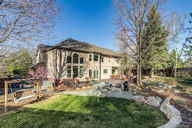 2464 Ginny Way, Lafayette, CO 80026 - back of property featuring stucco siding, french doors, and a patio area