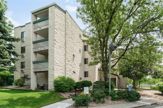 7780 W 38th Ave Unit 203, Wheat Ridge, CO 80033 - view of apartment building / complex