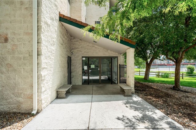 7780 W 38th Ave Unit 203, Wheat Ridge, CO 80033 - doorway to property with french doors