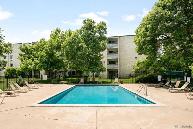 7780 W 38th Ave Unit 203, Wheat Ridge, CO 80033 - community pool with a patio area