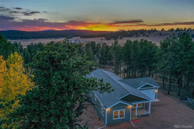 view of aerial view at dusk