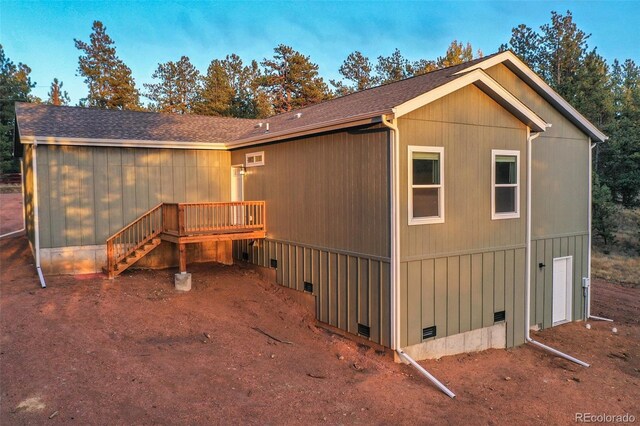 exterior space featuring a wooden deck