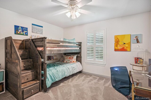 bedroom with carpet, baseboards, and ceiling fan