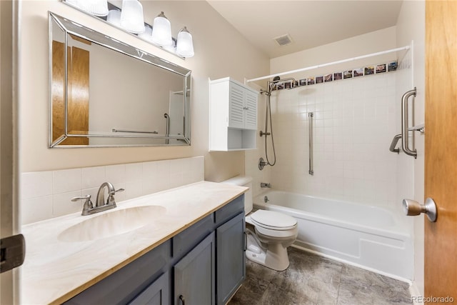 full bathroom featuring vanity, shower / bathing tub combination, tasteful backsplash, and toilet