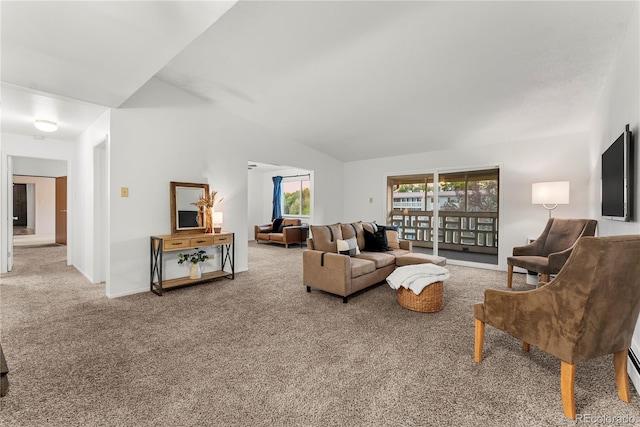 carpeted living room featuring vaulted ceiling