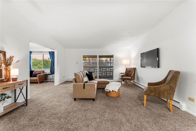 living room featuring baseboard heating and carpet