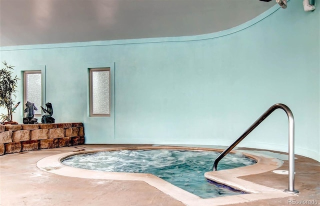 view of pool with an indoor in ground hot tub