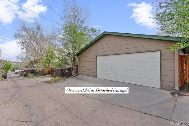 detached garage with fence