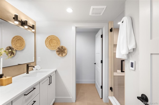 2520 S Cherokee St, Denver, CO 80223 - full bath with recessed lighting, baseboards, visible vents, tile patterned floors, and vanity