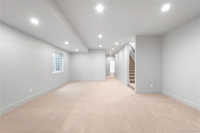 2520 S Cherokee St, Denver, CO 80223 - below grade area with stairs, light carpet, baseboards, and recessed lighting