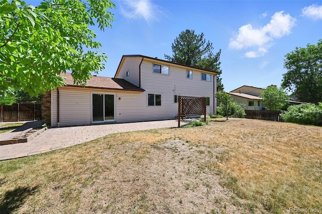 802 Altair Dr, Littleton, CO 80124 - rear view of property featuring a patio area