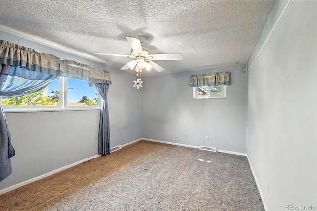 802 Altair Dr, Littleton, CO 80124 - empty room with a ceiling fan, carpet flooring, and a textured ceiling