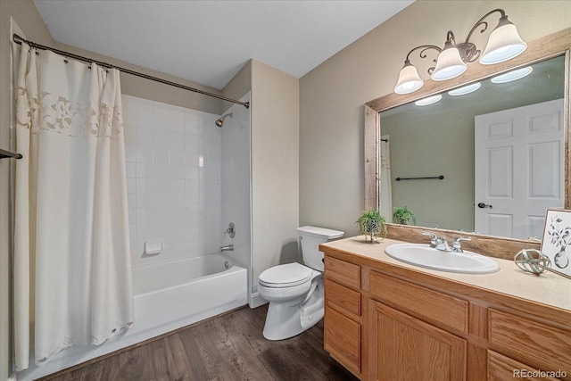 full bathroom with shower / bath combination with curtain, vanity, toilet, and hardwood / wood-style floors