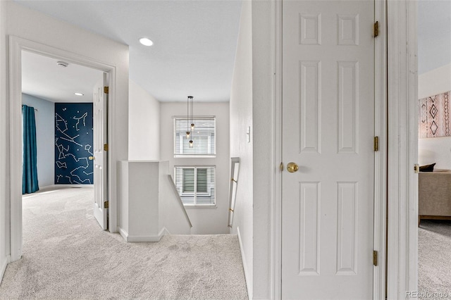 corridor featuring carpet floors