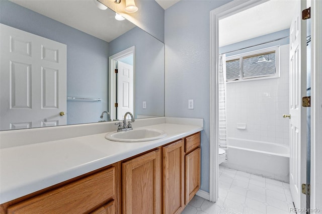 bathroom with tile patterned floors, toilet, and vanity