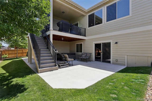 3125 Brunner Blvd, Johnstown, CO 80534 - back of house with a patio area, an outdoor hangout area, stairs, and a balcony