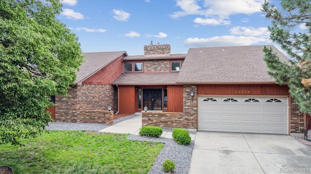 11254 E Colorado Dr, Aurora, CO 80012 - mid-century modern home with concrete driveway, a chimney, a garage, a shingled roof, and brick siding