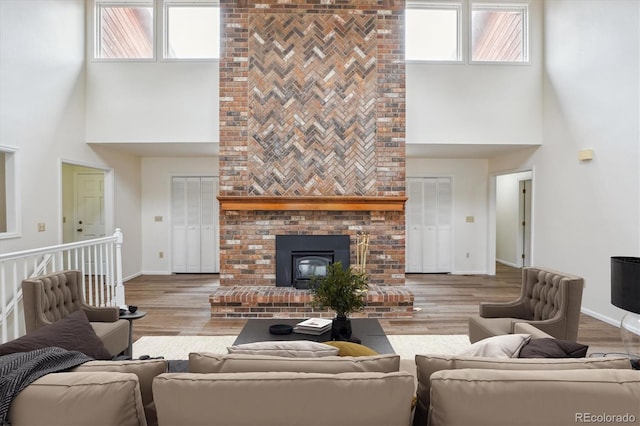 11254 E Colorado Dr, Aurora, CO 80012 - living room with a high ceiling and wood finished floors