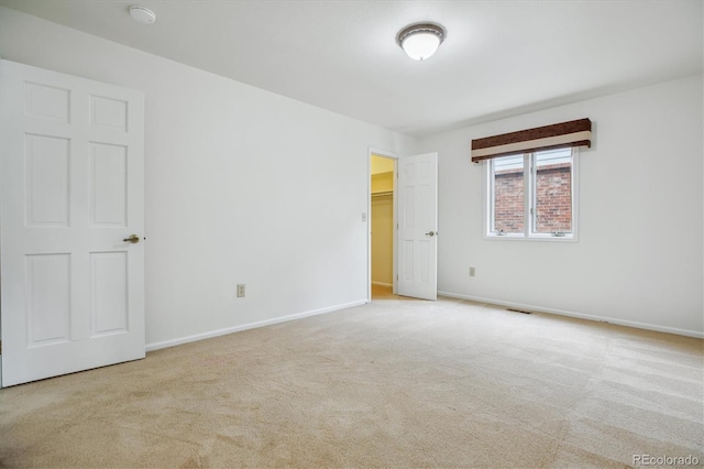 11254 E Colorado Dr, Aurora, CO 80012 - unfurnished bedroom with carpet flooring and a walk in closet