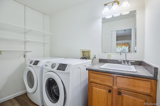 11254 E Colorado Dr, Aurora, CO 80012 - laundry room featuring independent washer and dryer and dark wood finished floors