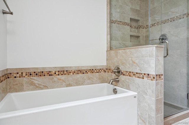11254 E Colorado Dr, Aurora, CO 80012 - full bath featuring a stall shower and a garden tub
