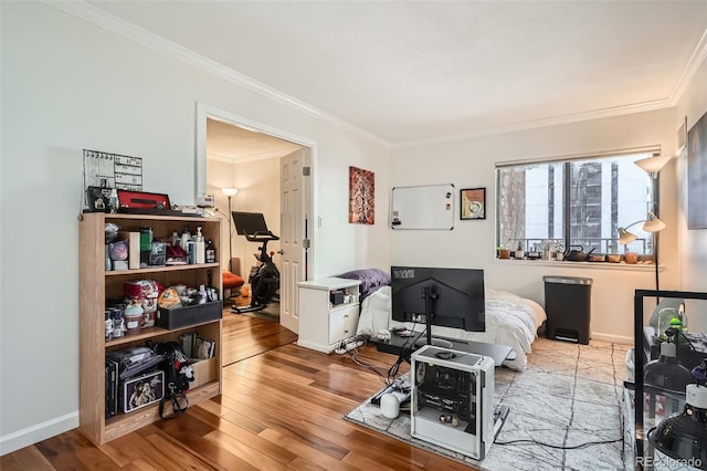 interior space featuring crown molding and light hardwood / wood-style floors