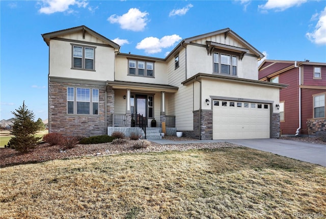 view of front of house with a front yard and a garage