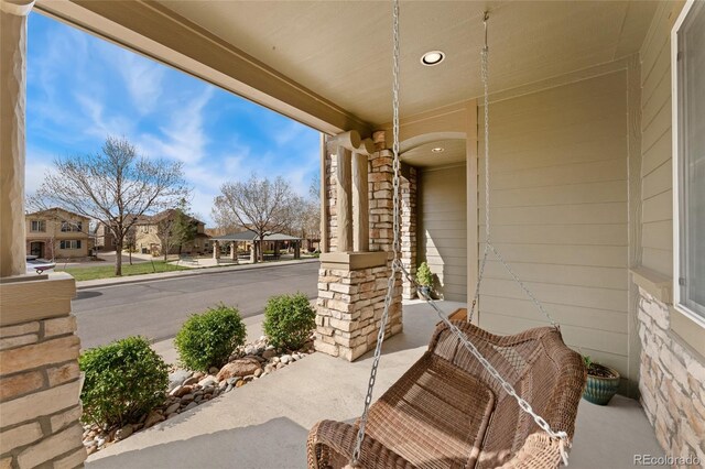 10618 Clearview Ln, Highlands Ranch, CO 80126 - view of patio with covered porch and a residential view