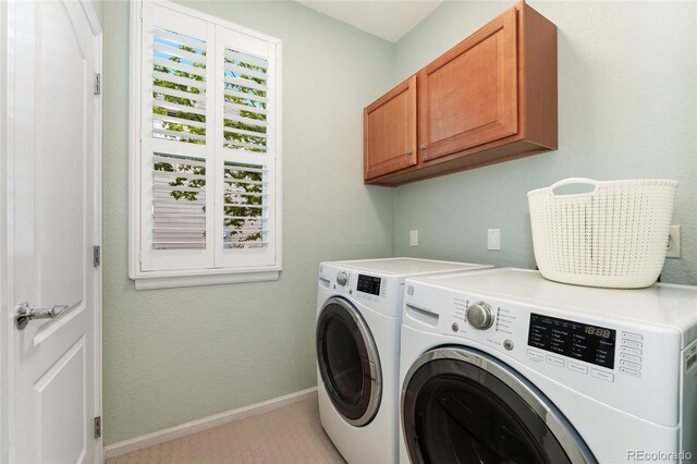 10618 Clearview Ln, Highlands Ranch, CO 80126 - laundry area featuring washer and dryer, cabinet space, and baseboards