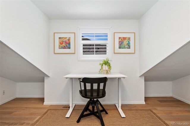 10618 Clearview Ln, Highlands Ranch, CO 80126 - home office featuring wood finished floors and baseboards