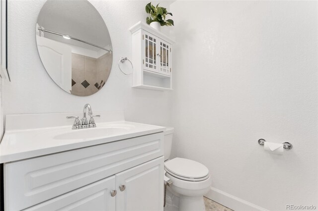 10618 Clearview Ln, Highlands Ranch, CO 80126 - full bathroom featuring vanity, toilet, and baseboards
