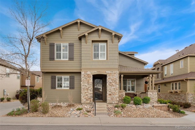 10618 Clearview Ln, Highlands Ranch, CO 80126 - view of front of property with a porch and stone siding