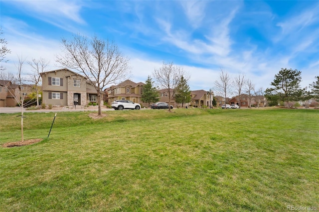 10618 Clearview Ln, Highlands Ranch, CO 80126 - view of green lawn with a residential view
